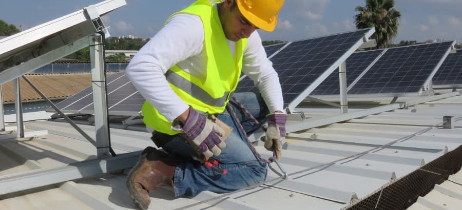 Worker On Roof