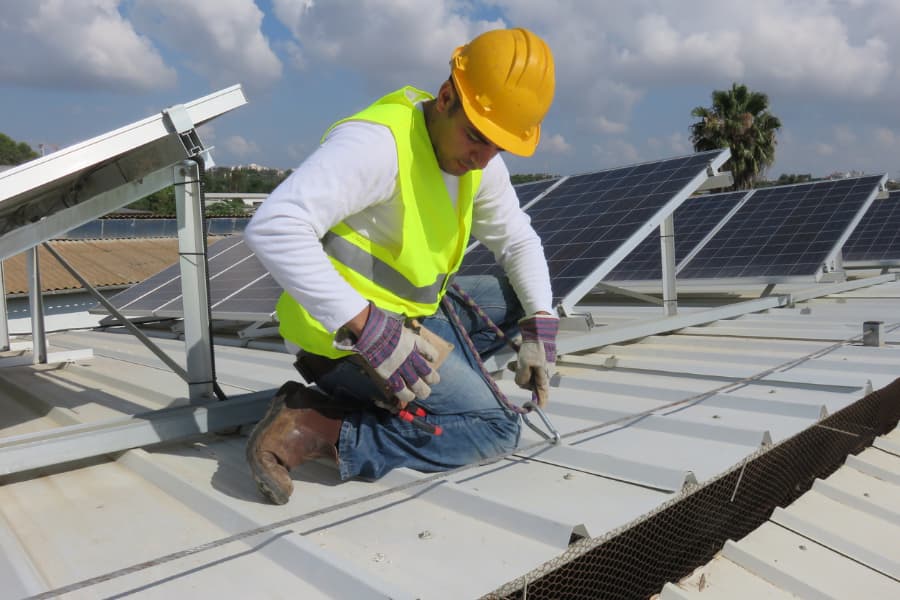 Worker On Roof