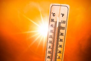 Hot Sun And Thermometer Indicate High Temperatures