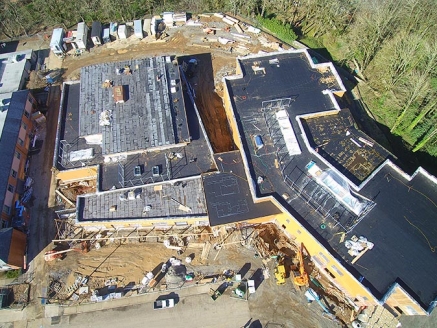 Aerial view of a roof on a large commercial building