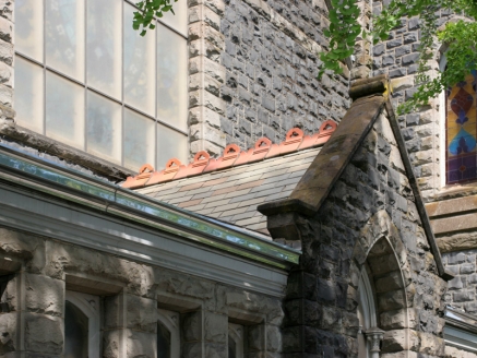 A close-up view of slate roofing on a church