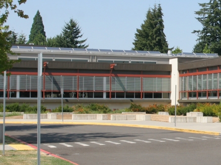 Ground-level view of a building with solar roofing